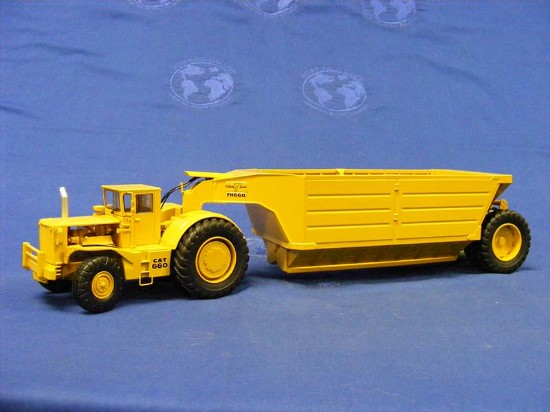 cat-660-with-athey-bottom-dump-classic-construction-CCM660